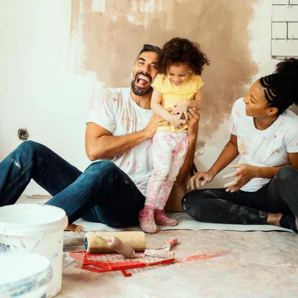Family painting their home